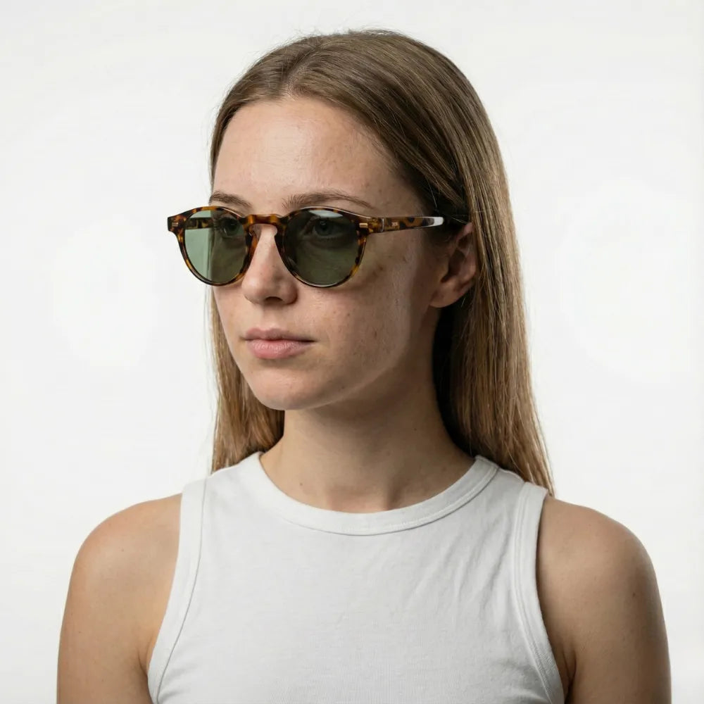 Translucent round acetate sunglasses, close-up detail — HARO Côte d'Azur Èze