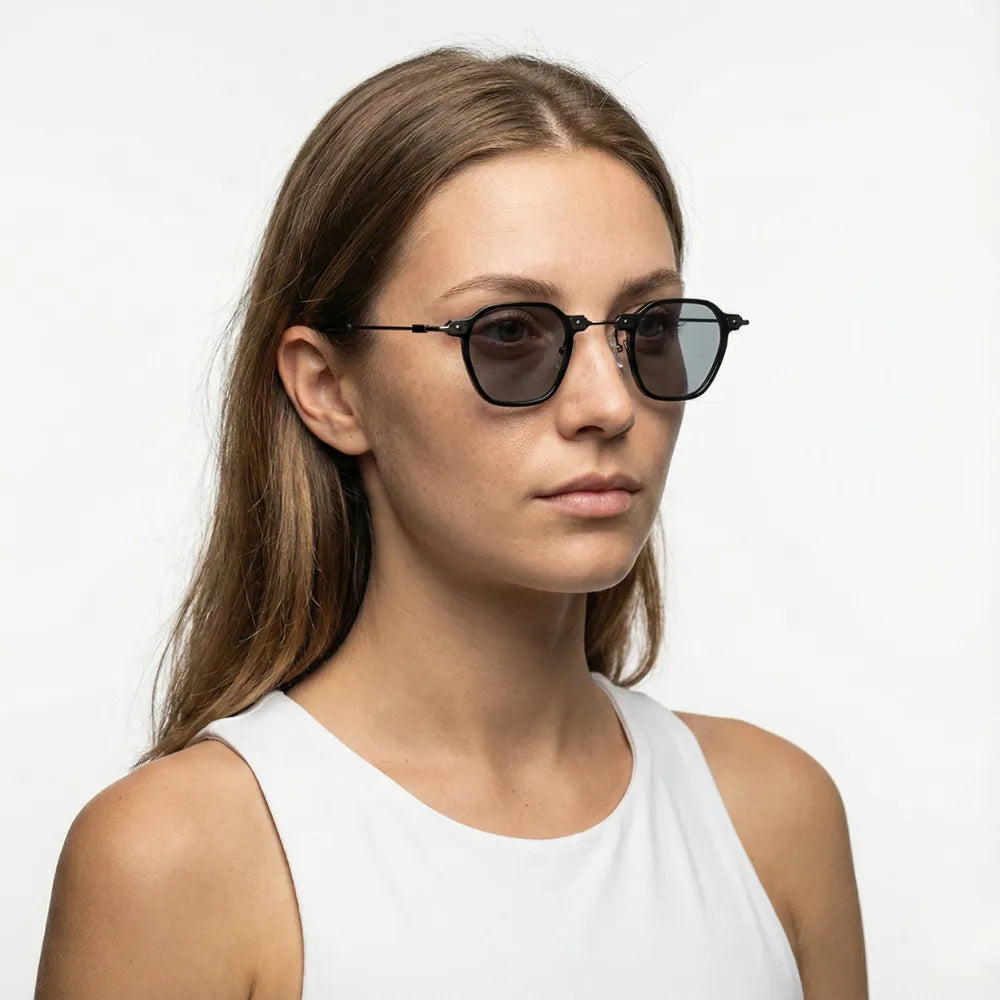 Hexagonal metal sunglasses, model portrait — HARO Porto Cervo